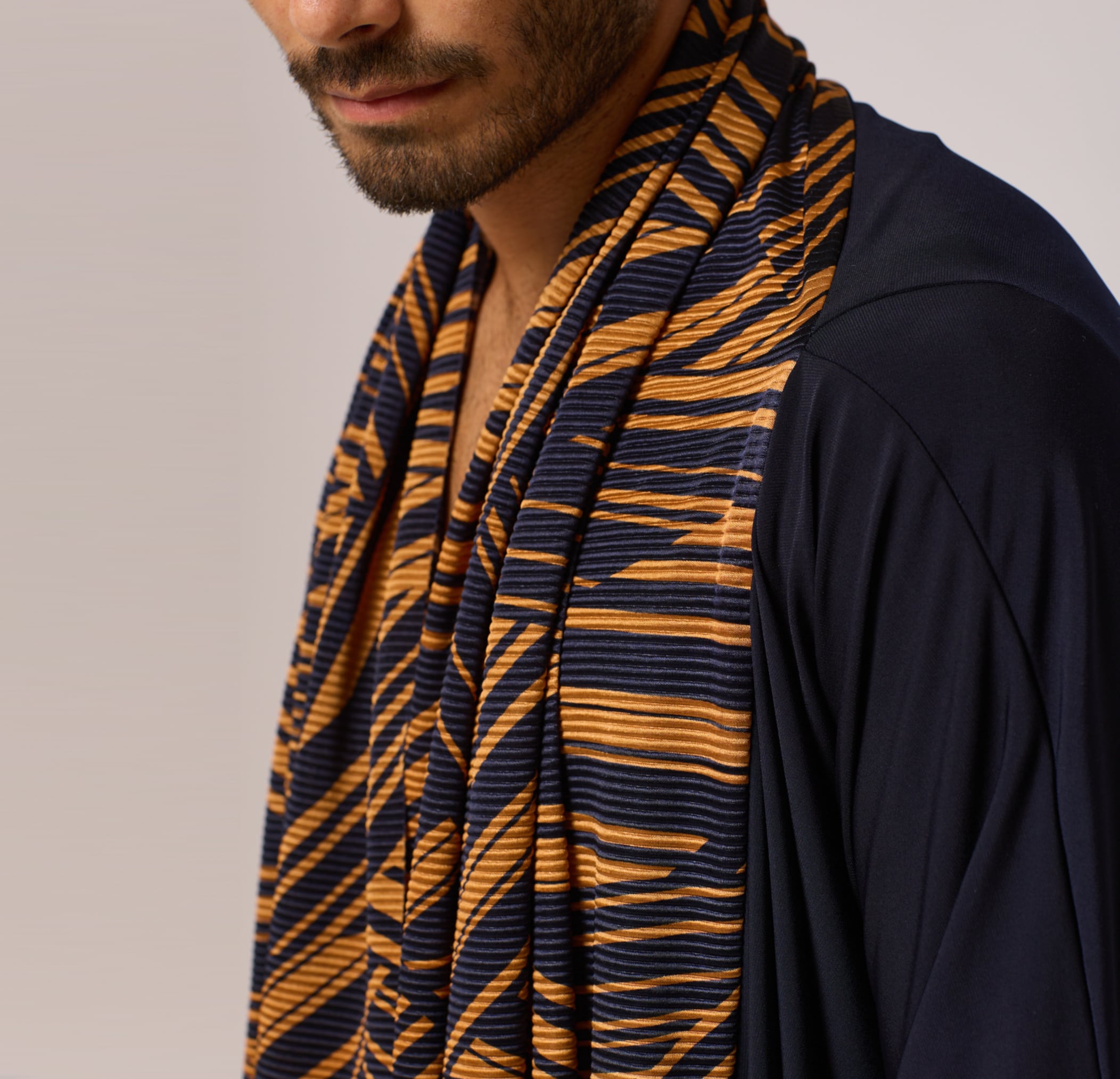 ZERØ London - Close up, mens zero waste long sleeve jersey cardigan in navy with gold geometric print designed & made in London