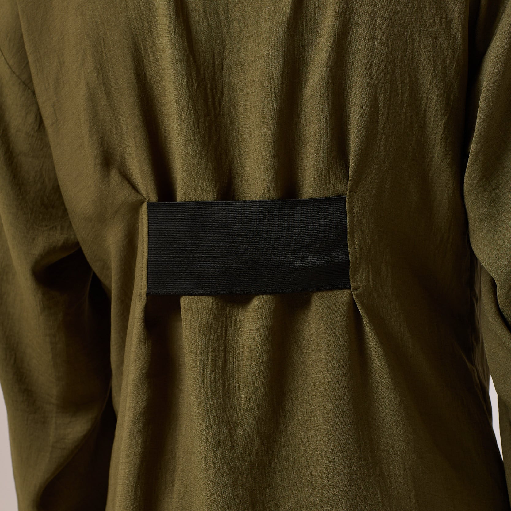   ZERØ London - Close up view, olive green long sleeve mens zero waste shirt designed & made in London