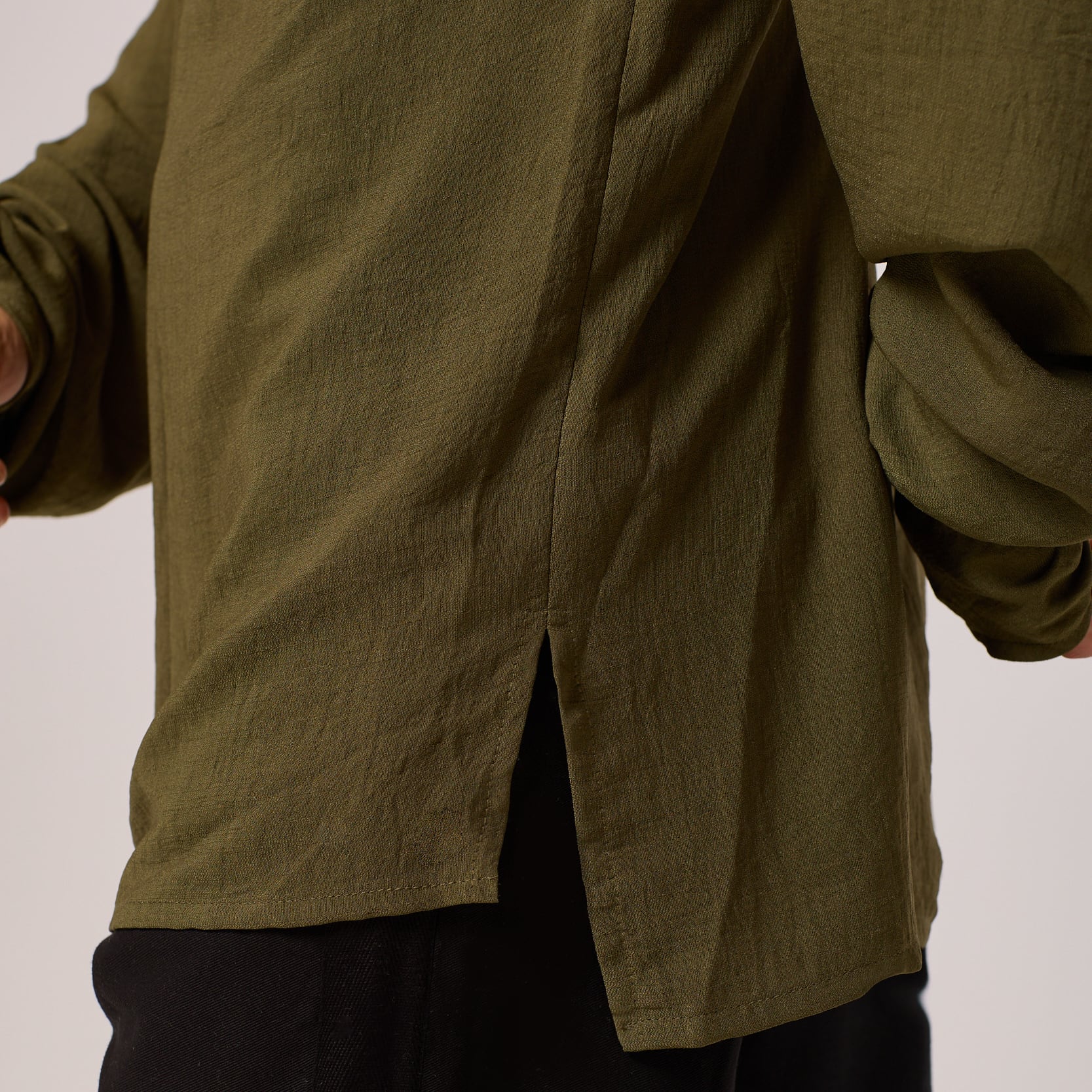   ZERØ London - Close up view, olive green long sleeve mens zero waste shirt designed & made in London