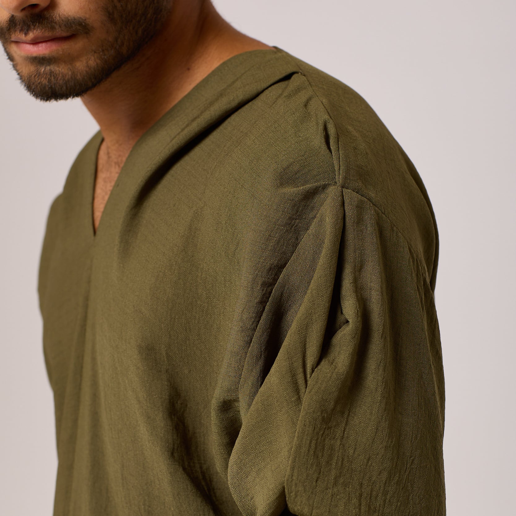 ZERØ London - Close up view, olive green long sleeve mens zero waste shirt designed & made in London