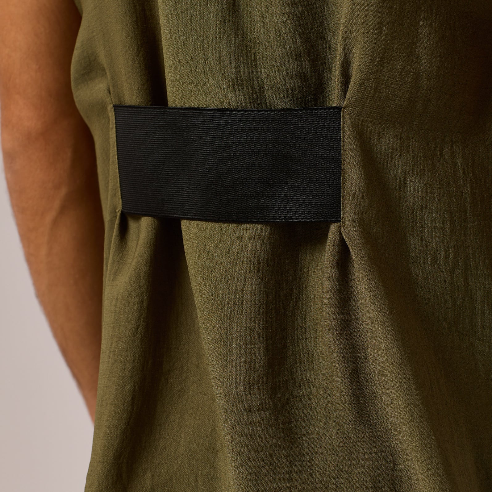   ZERØ London - Close up view, olive green mens zero waste vest designed & made in London