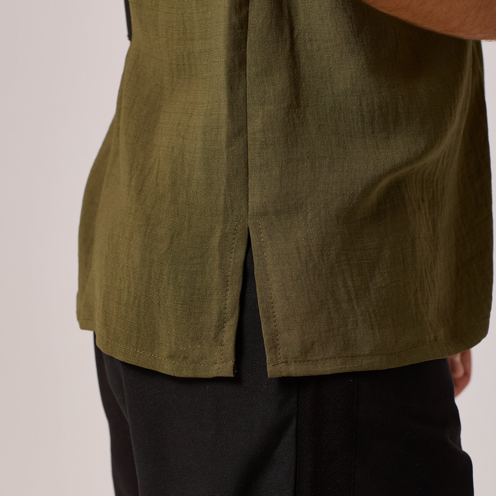   ZERØ London - Close up view, olive green mens zero waste vest designed & made in London